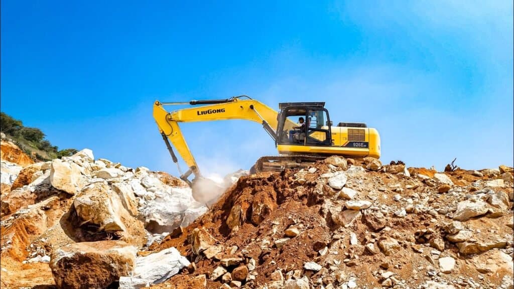 Excavator working in the field